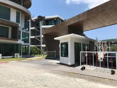 a building with a gate in front of it at The Nai Thon Condominium Unit in Nai Thon Beach