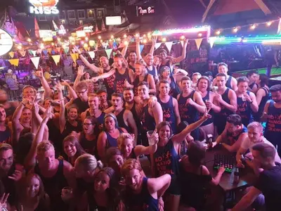 a large group of people in a crowd at a concert at Sleeper Hostel in Ao Nang Beach