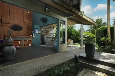 a house with a living room and a kitchen at Tea Tree Boutique Resort in Rawai Beach