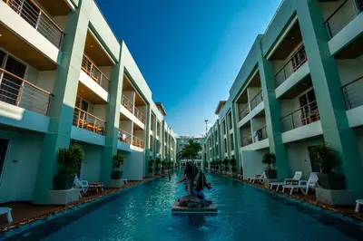 a fountain in the middle of a pool in a building at Phi Phi Harbour View Hotel in Phi Phi Don