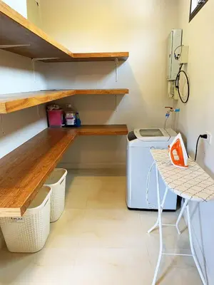 a laundry room with a counter and a washing machine at Cozy Two Bedrooms Villa by G Estate in Rawai Beach