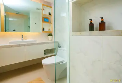 a bathroom with a toilet and a sink at Cute Studio in Aristo Beach condo - 7 min walk to Surin Beach, construction view in Surin Beach