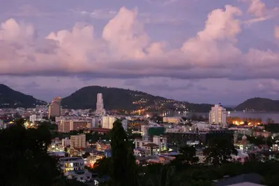 a view of a city at night at Prince Edouard Apartments & Resort Patong Beach Phuket in Patong Beach