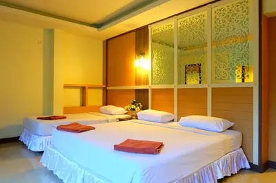 two beds in a room with white sheets at Aonang Top View in Ao Nang Beach