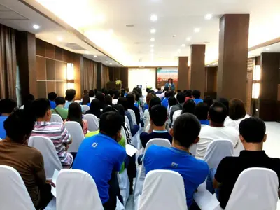 a group of people sitting in chairs in a room at Princess Seaview Resort & Spa - SHA Plus in Karon Beach