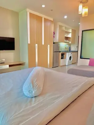a large bed with a pillow on it in a room at Супер апартаменты Найтон Naithon in Nai Thon Beach