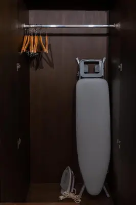a white water tank in a bathroom with a door at VILLA Iotama Private Pool Nai Harn Beach in Rawai Beach