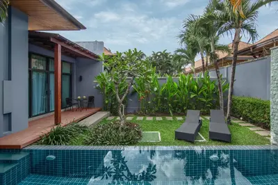 a resort with a swimming pool and a house at VILLA JAVA Private Pool Nai Harn Beach in Rawai Beach