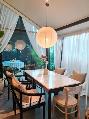 a dining room with a table and chairs at Villa 3 Bedrooms with private pool at Wings Pasak in Bang Tao Beach