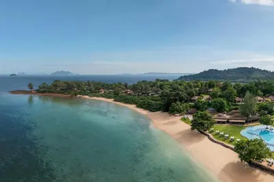 an aerial view of a beach with a resort at The Naka Island, a Luxury Collection Resort & Spa, Phuket in Ko Naka