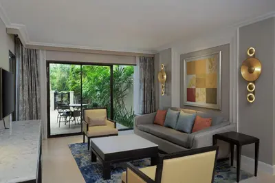 a living room with a couch and a table at Marriott's Mai Khao Resort - Phuket in Mai Khao Beach