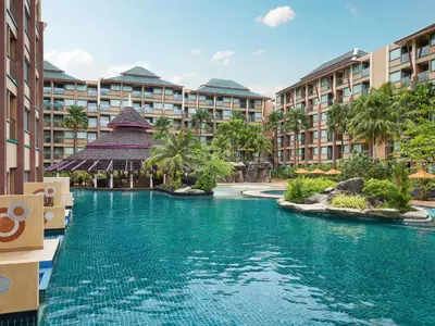 an image of a swimming pool at a resort at Novotel Phuket Vintage Park Resort in Patong Beach