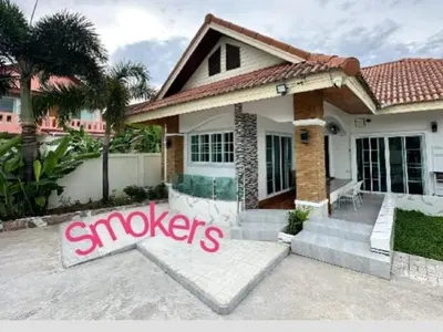 a house with a sign that says shocks at 3BR Villa near Laguna beach in Bang Tao Beach
