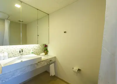 a bathroom with a sink and a mirror at The heights Penthouse Ocean view A11 Near Kata Beach in Kata Beach