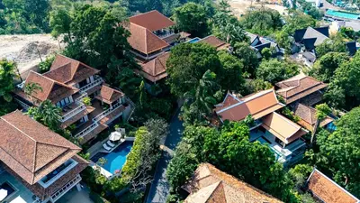 an aerial view of a house with a pool and trees at Katamanda Kata View villa E5 near kata Noi Beach in Kata Beach