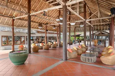 a building with lots of pots and baskets on the floor at SAii Phi Phi Island Village in Phi Phi Don