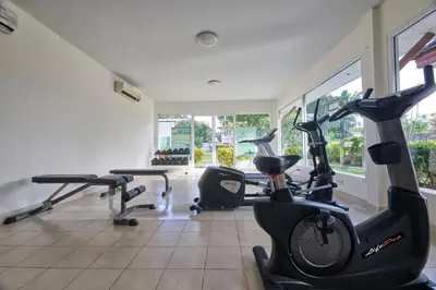 a gym with two exercise bikes in a room at Sea eagle pool villa in Ao Nang Beach