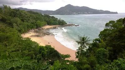 a view of a beach with trees and the ocean at U Sabai Living Hotel in Patong Beach