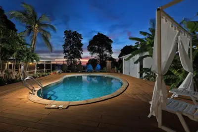 a swimming pool in the middle of a patio at Daydream villa resort in Patong Beach