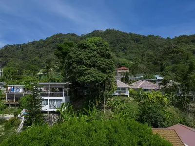 a resort in the middle of a mountain at Daydream villa resort in Patong Beach