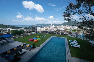 a view of a swimming pool on top of a building at Villa Enjoy Phuket in Patong Beach