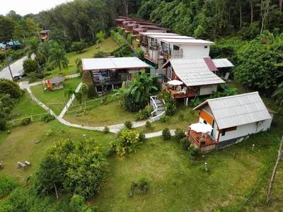 an aerial view of a house with a yard at Resting Place Ko Yao Yai in Ko Yao Yai