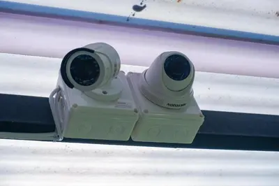a pair of binoculars sitting on a shelf at Ibiza House Phi Phi in Phi Phi Don