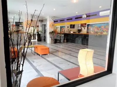 a lobby with a bowling alley in a store at D2 lamoon resotel in Phuket Town