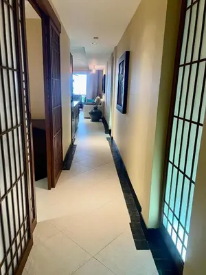 a hallway in a house with a long hallway at Luxury Apartment Kata Beach The Accenta in Kata Beach