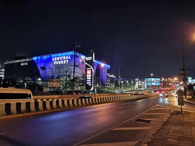 a city street at night with a building with blue lights at 4 Floor - Centrio Condominium in Phuket town in Phuket Town