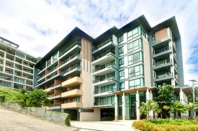an exterior view of a building at WOW Apartment at Unity Patong in Patong Beach