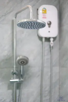 a shower with a sink and a shower at Enjoy Sunset Rainbow Alley - WOW Townhouse at Patong Hill in Patong Beach