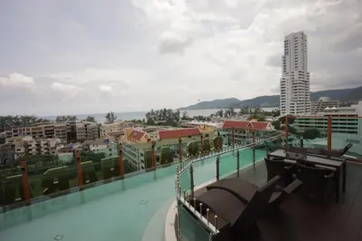 a large swimming pool on the roof of a building at BAB ALHARA HOTEL in Patong Beach