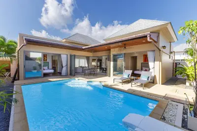 a swimming pool in front of a villa at New Boutique Pool Villa Sequoia Close to Rawai and Naiharn Beach in Rawai Beach