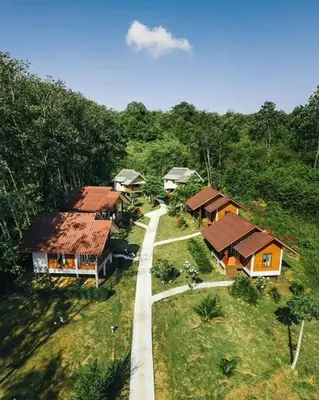 an overhead view of a village with houses and a road at Mookanda bungalow in Ko Yao Noi