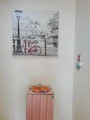 a picture of two bikes on top of a cabinet at We Love Kata in Kata Beach