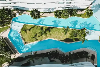 an aerial view of the pool at the resort at Wyndham La Vita Rawai Phuket in Rawai Beach