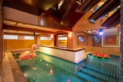 a swimming pool with an inflatable at Phuket Pool Villa Sea view at town in Phuket Town