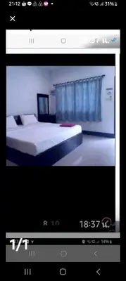 a picture of a bedroom with a bed at Teahouse in Phuket Town