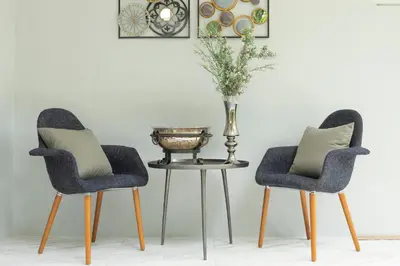 two chairs and a table with a vase on it at Palmetto by Holy Cow, 2-BR, jungle view in Karon Beach