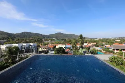 a view of a swimming pool at a resort at Relife Windy by Holy Cow, studio with sofa-bed in Rawai Beach