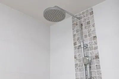 a shower with a shower head in a bathroom at 1bdr Pool Access Apartment Bangtao #5103 in Bang Tao Beach