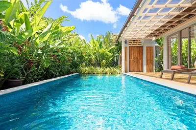 a swimming pool in the backyard of a villa at Private Resort Boutique Pool Villa Dalaa 5 , near Kamala Beach in Kamala Beach