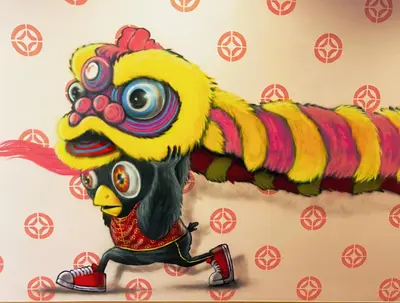 a painting of a rooster on a cake at Capzule Bed Phuket in Phuket Town