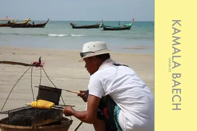 a man is on the beach with a net at Stylish Condo Stunning Views in Kamala Beach