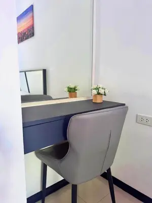 a desk with two potted plants on top of it at NBC Condo, 2-BR, NaiHarn Beach in Nai Harn Beach