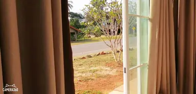 an open window with a view of a road at Khao Thong Home Stay in Krabi town