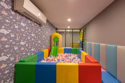 a childrens play room with a pile of balls at Sea View 1-BR 36 m2 Panora Surin by Holy Cow in Surin Beach