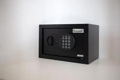 a small microwave oven sitting on a white counter at 2BDR Apartment near Surin beach PALM-C703 in Surin Beach