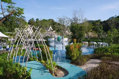 a pool at a resort with a water park at Banyan Tree Krabi in Tab Kaek Beach